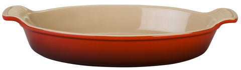 Le Creuset Heritage oval au gratin dish in Cerise showing even heat for thorough baking