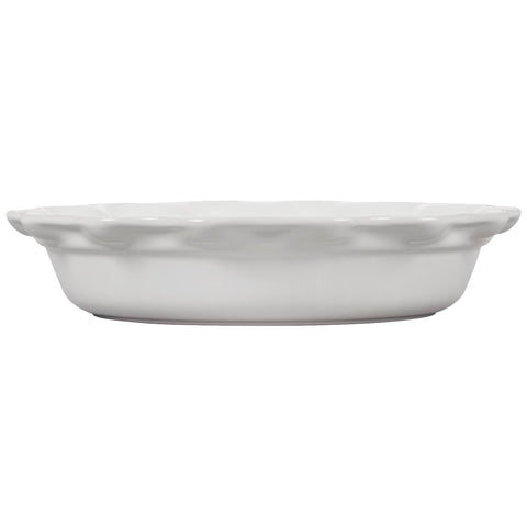 Le Creuset Heritage Pie Dish 9-inch white scalloped edge close-up highlights elegant presentation.