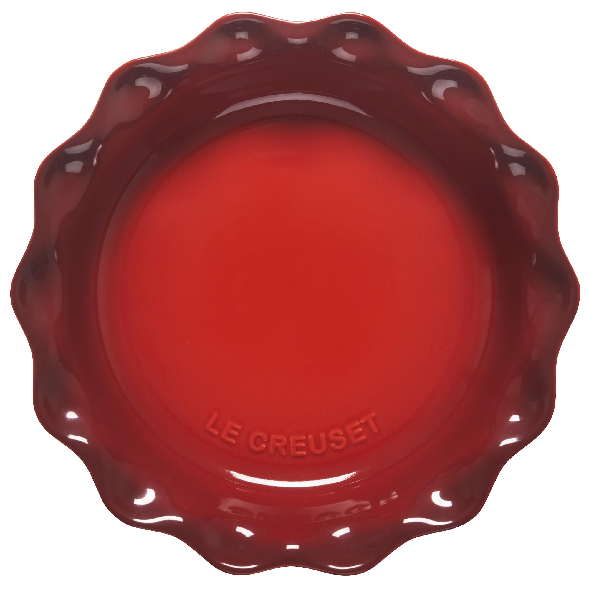 Le Creuset Heritage Pie Dish Cerise highlighting the scalloped edge for elegant slices.