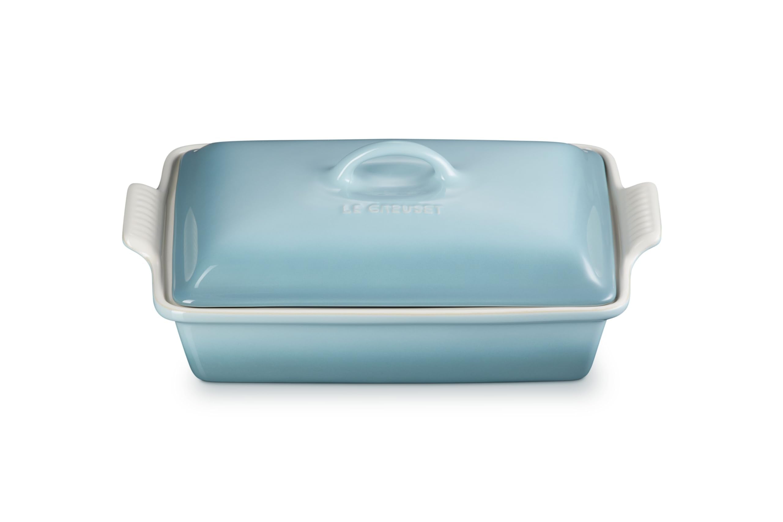 Le Creuset Heritage rectangular casserole with lid in Sea Salt glaze for moisture retention.