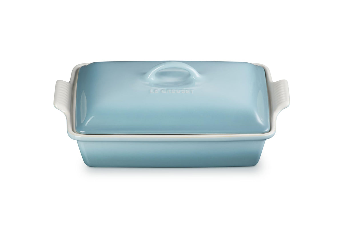 Le Creuset Heritage rectangular casserole with lid in Sea Salt glaze for moisture retention.