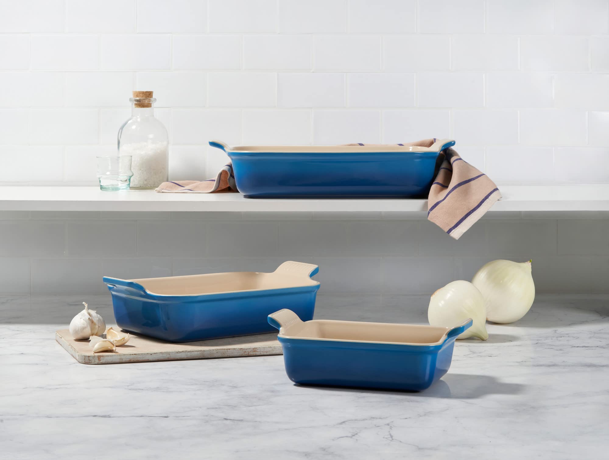 Le Creuset Heritage set displayed on counter for oven-to-table use