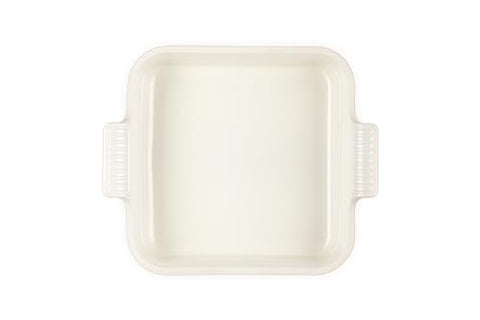 Le Creuset Heritage Square 3qt Peche close-up emphasizes nonstick surface and easy release.