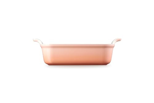 Le Creuset Heritage Square 3qt Peche on table demonstrates versatile serving and presentation.
