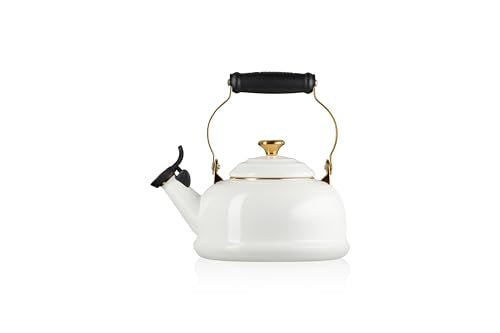 White enamel finish on Le Creuset kettle resists stains and wear.