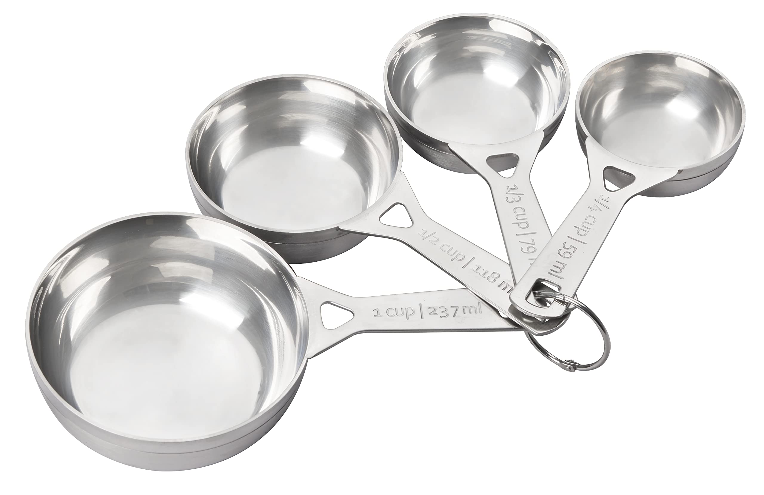 Le Creuset quarter-cup measuring cup for precise dry ingredient measures in baking.