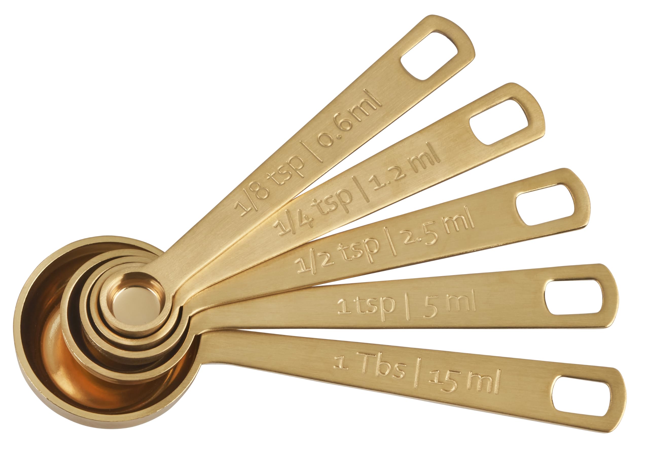 Le Creuset gold measuring spoon 1/8tsp for precise spice measurements.