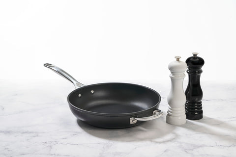 Le Creuset two-mill set on display with coordinated styling
