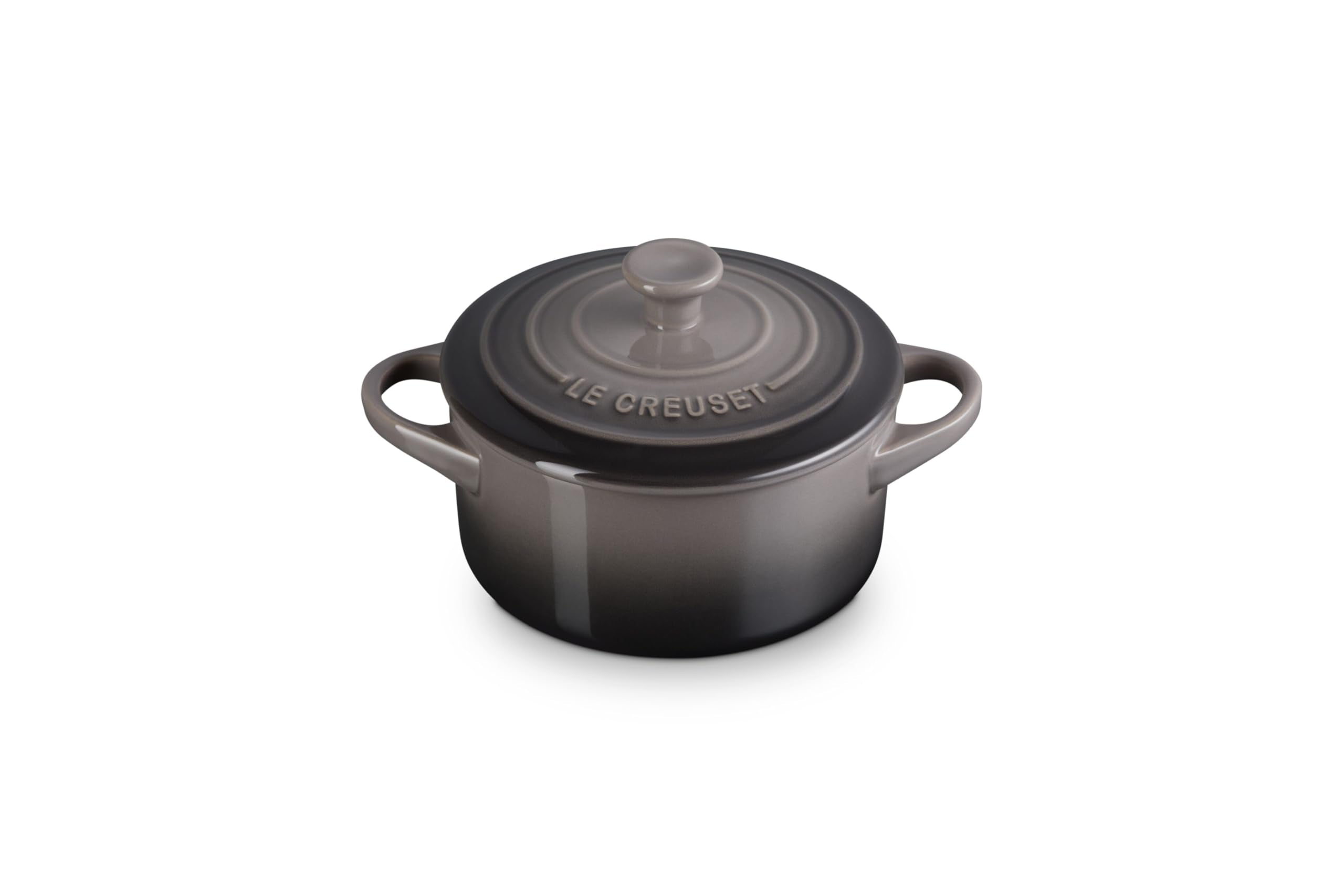 Le Creuset mini round cocotte in oyster, front view, even heat distribution.