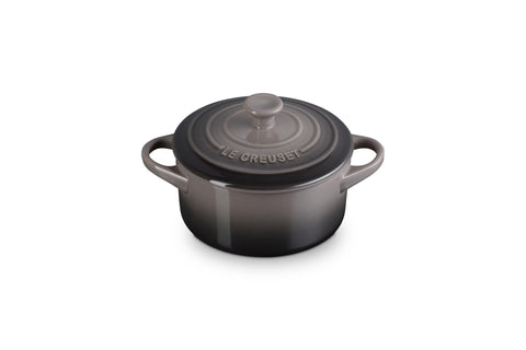Le Creuset mini round cocotte in oyster, front view, even heat distribution.
