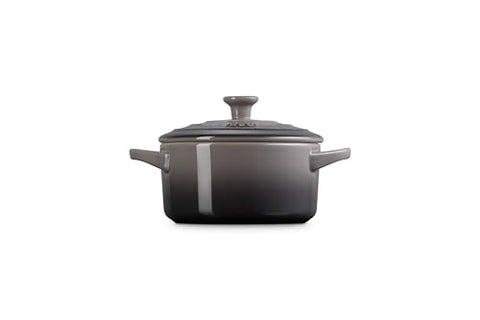Le Creuset oyster glaze close-up, nonstick surface releases food easily.