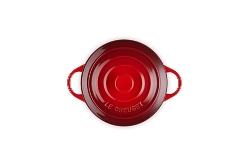 Le Creuset cerise cocotte highlights nonporous glaze resisting stains and flavor transfer