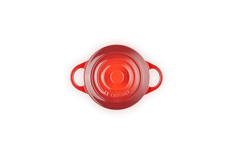 Close-up of Le Creuset cerise glaze showing a smooth, nonporous surface.