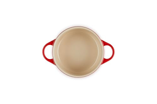 Le Creuset stoneware cocotte cerise demonstrates virtually nonstick surface for quick release