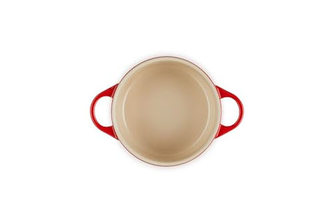 Le Creuset stoneware cocotte cerise demonstrates virtually nonstick surface for quick release