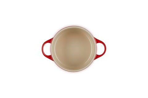 Le Creuset mini round cocotte cerise table setting with elegant presentation