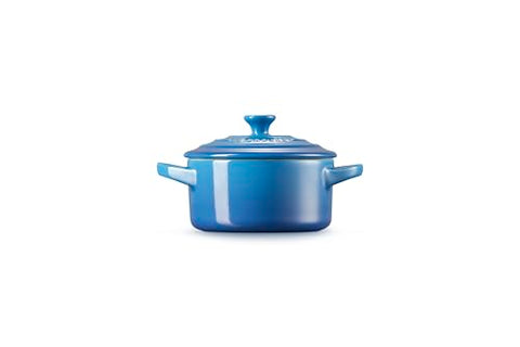 Le Creuset mini round cocotte Marseille with handles for easy transport from oven to table.