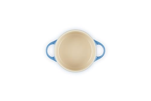 Le Creuset Marseille cocotte interior glaze visible, non-porous surface resists odors and stains.