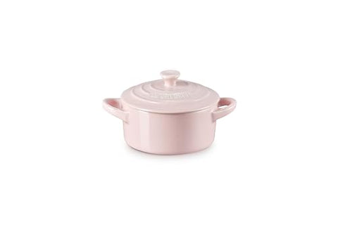 Le Creuset mini round cocotte vibrant glaze resists stains and flavor transfer.