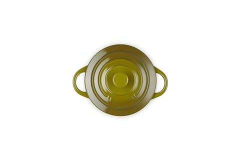 Le Creuset olive cocotte for baking, showing even browning and easy release.