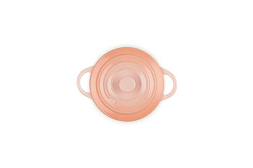 Le Creuset Peche cocotte with nonstick glaze for easy release.