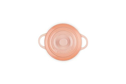 Le Creuset Peche cocotte with nonstick glaze for easy release.
