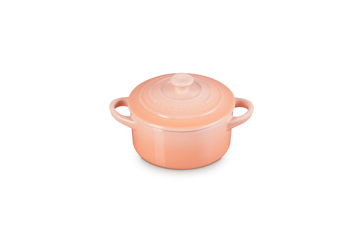 Le Creuset Peche mini cocotte with gold heart knob, ideal for gifting desserts.