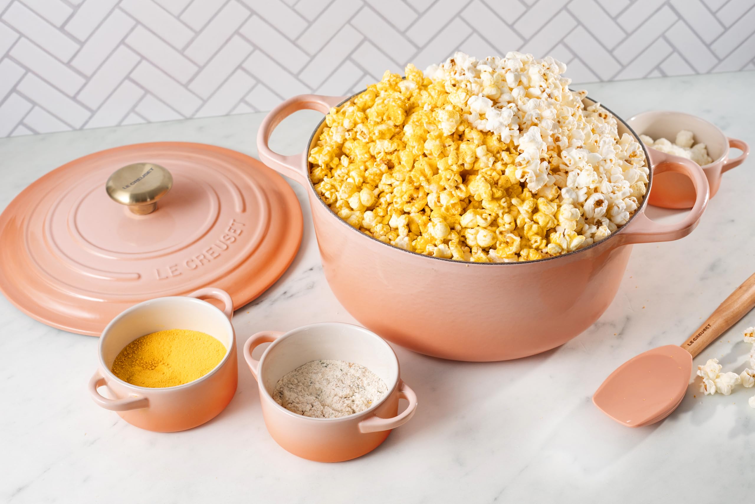 Le Creuset Peche cocotte glaze resists flavors and staining for longevity.