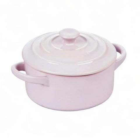 Le Creuset stoneware versatile for prep, storage, and decorative table presence.