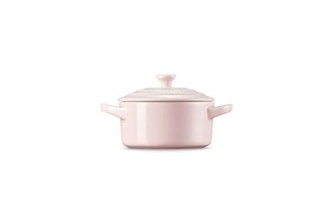 Le Creuset mini round cocotte exceptional heat distribution for even browning.