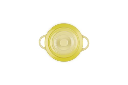 Le Creuset mini round cocotte Soleil side handle demonstrates easy grip for serving.