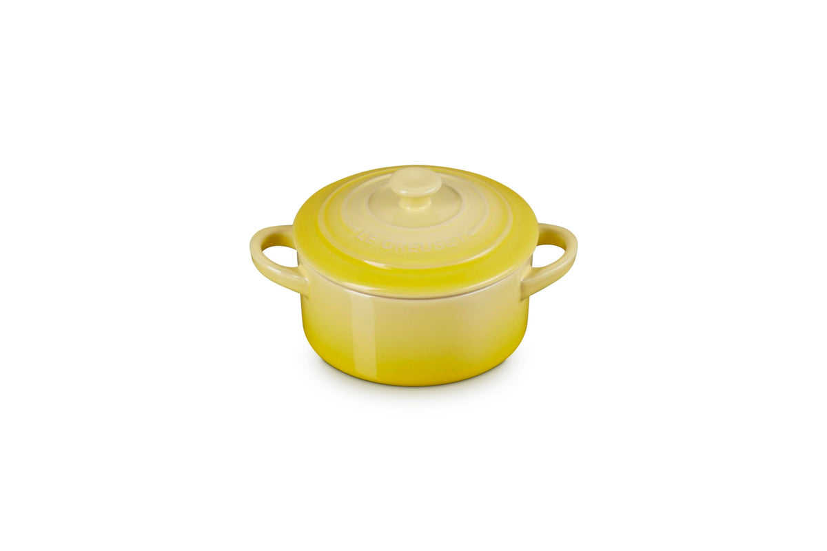 Le Creuset mini round cocotte Soleil top view highlighting vibrant glaze for individual servings.