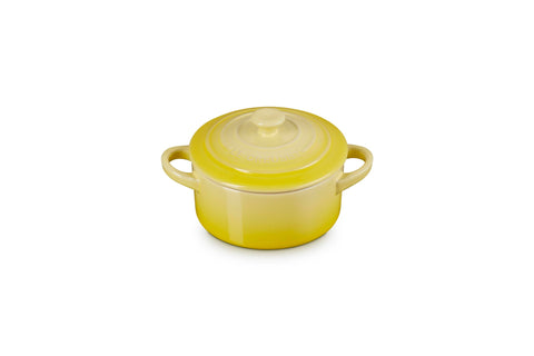 Le Creuset mini round cocotte Soleil top view highlighting vibrant glaze for individual servings.