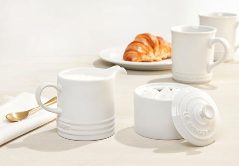 Le Creuset 14 oz white mug set on display showing cohesive collection