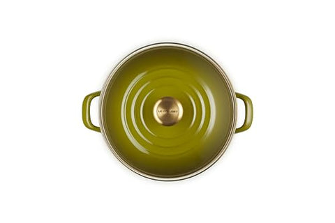 Le Creuset olive stockpot with lid showcases secure coverage for simmering