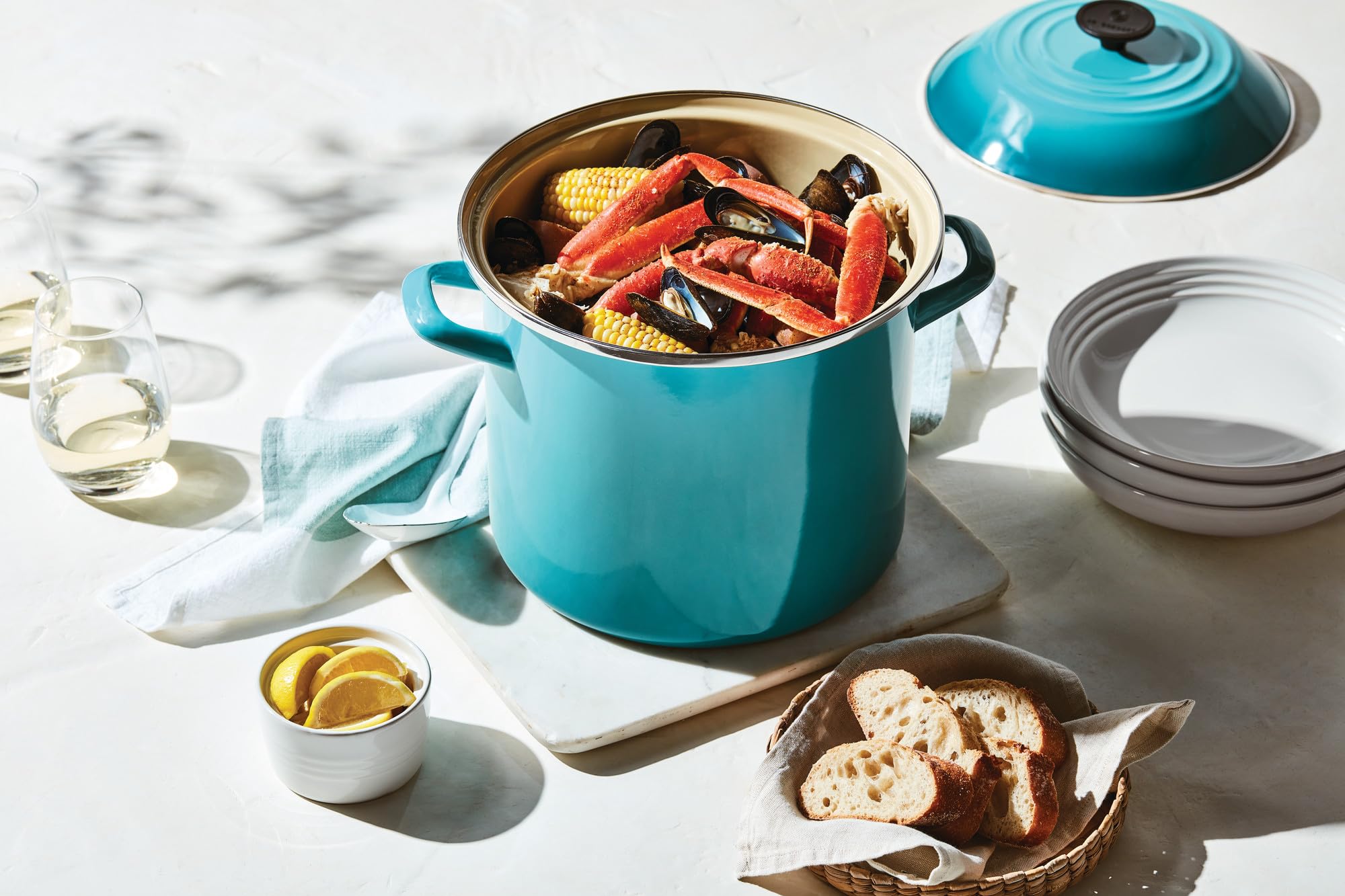 Le Creuset olive stockpot stack demonstrates compact storage when not in use