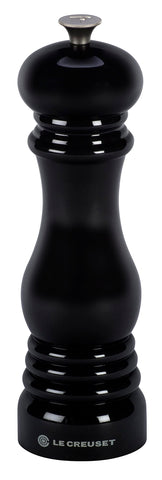Le Creuset pepper mill 8in black with ceramic grinder for consistent pepper grinding.