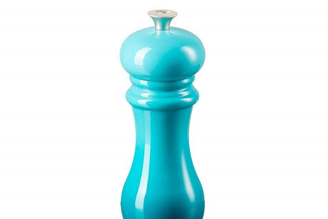 Le Creuset Caribbean pepper mill elegant kitchen accessory matches decor.