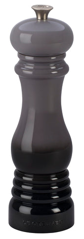 Le Creuset pepper mill ceramic grinder delivers precise grinding for fresh pepper.