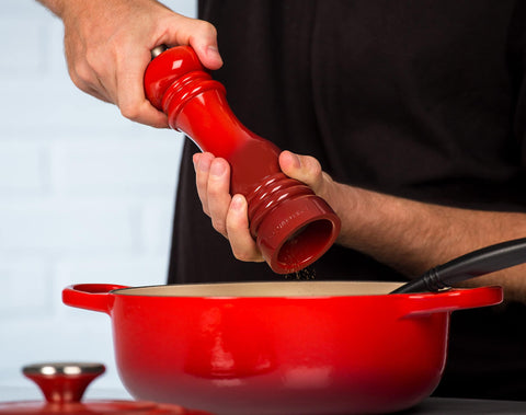 Le Creuset pepper mill cerise close-up grinder detail showing durable ceramic mechanism