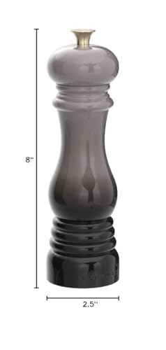 Le Creuset pepper mill grinding action ready for fresh meals.