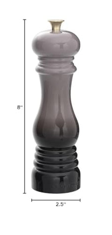 Le Creuset pepper mill grinding action ready for fresh meals.