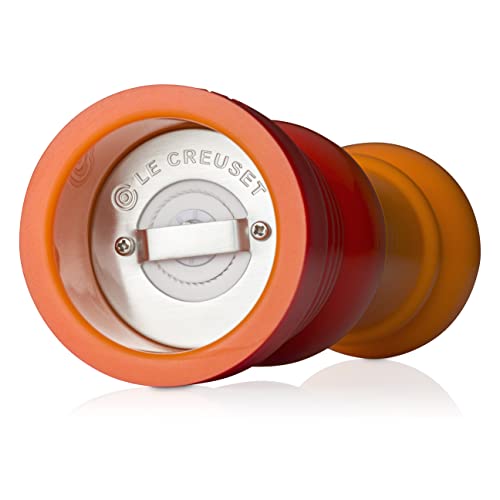 Le Creuset pepper mill being hand washed to show care