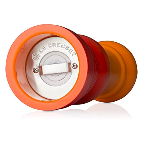 Le Creuset pepper mill being hand washed to show care