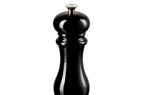 Le Creuset pepper mill on kitchen counter complements any decor.