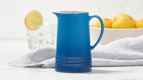 Le Creuset 10 oz pitcher spout close-up emphasizes easy-pour design and minimal drips.