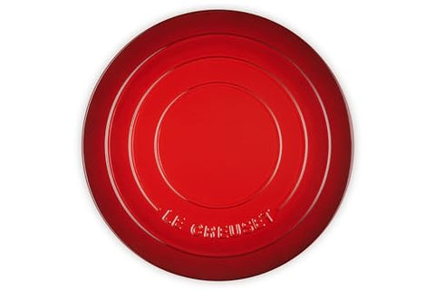 Le Creuset cerise unglazed side pizza stone delivers crispy crusts and even browning