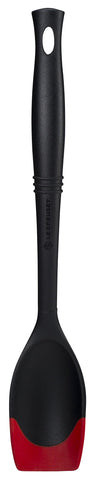 Le Creuset Revolution Bi-Material Saute Spoon 13.5-inch Cerise, versatile for tossing and lifting in nonstick pans