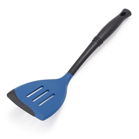 Le Creuset Revolution spatula beveled edge for safe nonstick flipping and precise control