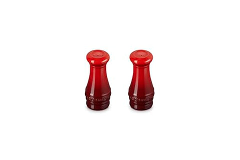 Le Creuset salt and pepper shakers Cerise, close-up enamel, odor-resistant.